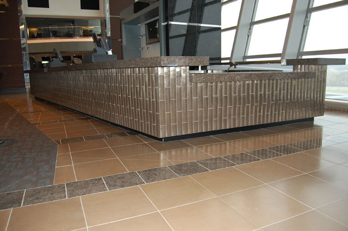 Cowboys Stadium, Arlington: a tile-faced bar front on the concourse floor